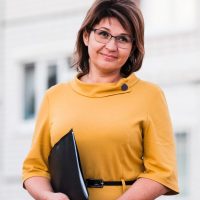 female-teacher-outdoor-standing